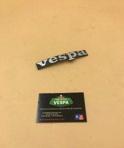 Monogramme (badge,logo) de tablier en aluminium pour Vespa Px / Arco (entre axe 59mm)