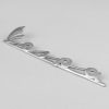 Logo (badge - insigne) de tablier pour vespa 50 / Dimension  142x32 mm - aluminium poli - fixation: 3 broches
